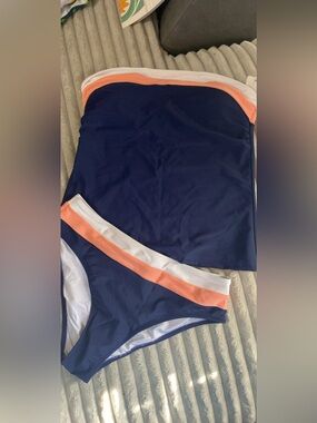 Navy Blue Two-Piece Swim Set with Peach and White Trim